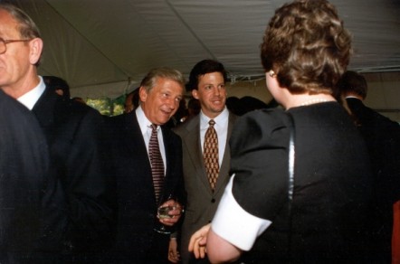 Chairman Bud Shuster of the House Committee on Transportation and Infrastructure with Taylor Bowlden of the American Highway Users Alliance talk with Susan Eisenhower (back to camera).