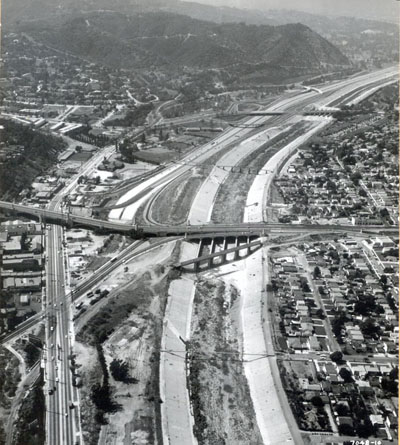 Interstate 5 Interchange with Interstate 10 looking northerly. To the right is the San Bernardino Freeway toward Pomona. To the left is Los Angeles. State Street structure is directly in front of the County Hospital. Nov. 15, 1959.