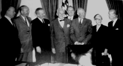 On January 13, 1960, President Eisenhower signed Executive Order 10858 giving a formal status to the Committee for Traffic Safety. Committee Chairman William Randolph Hearst, Jr., is second from the left.