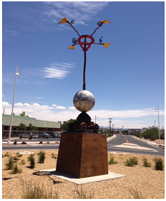 Sculpture in the center of a roundabout.