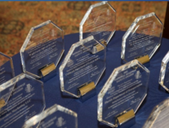 Table set with glass etched Road Safety Awards.