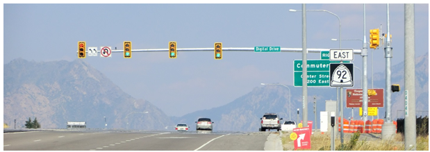 Example of traffic signal heads featuring backplates with retroreflective borders