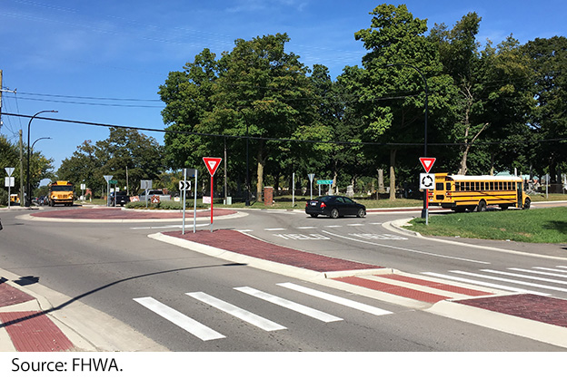 While crossing a road without zebra crossing, one must proceed only if