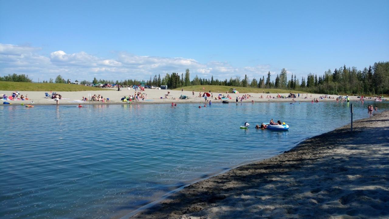 Existing swim beach view looking north towards parking lot and chemical toilets.