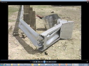 "A series of 4 photos from above of car hitting a guardrail terminal during crash testing. Showing the guardrail only - post impact.