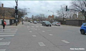 Bus stop and shared lane at intersection, through intersection markings Photo: Stacey Meekins