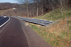 Photo. This photo shows another burried-in-backslope end treatment.