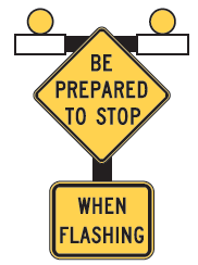 Figure 53. An image of a 'BE PREPARED TO STOP' (MUTCD W3-4) sign above a supplemental 'WHEN FLASHING' (MUTCD W16-13) plaque.  Two yellow beacons are mounted above the two signs.