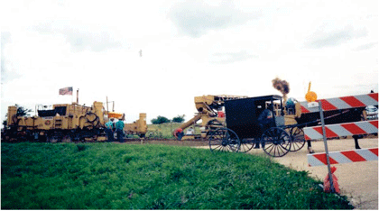 "This photo shows construction being done on a road."