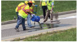 Workers applying HFST.