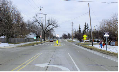 Mid-block pedestrian refuge island in a suburban neighborhood