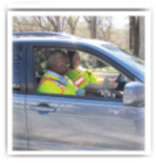 Photo: Workers in Car