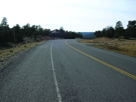 Photo 2 is Looking south along N12 at audit site south of Highway 264.The cross-section is a two-lane rural road with wide paved shoulders.