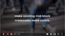 Screenshot of video reads Make existing mid-block crosswalks more visible.