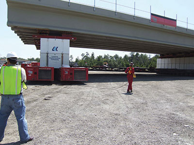 FDOT workers here use an SPMT to replace the span of the Graves Avenue bridge. FHWA will help promote such vanguard technologies through additional demonstrations.