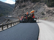 A work crew is using WMA to pave this section of the East Entrance Road inside Yellowstone National Park, WY, between the East Entrance Gate and Sylvan Pass in fall 2007.