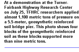 This photo shows four layers of geosynthetic reinforced soil supporting more than nine metric tons.