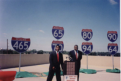 Stan Smith (right), commissioner of the Indiana Department of Transportation, introduced Administrator Slater at a happy 40th birthday ceremony in Indianapolis.