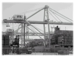 A large crane unloading cargo at a port