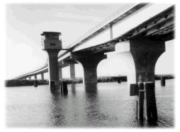 A large bridge above a large mass of water