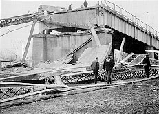 The U.S. 35 Silver Bridge, completed in 1928 (top) and following its collapse, a view from the Ohio side.