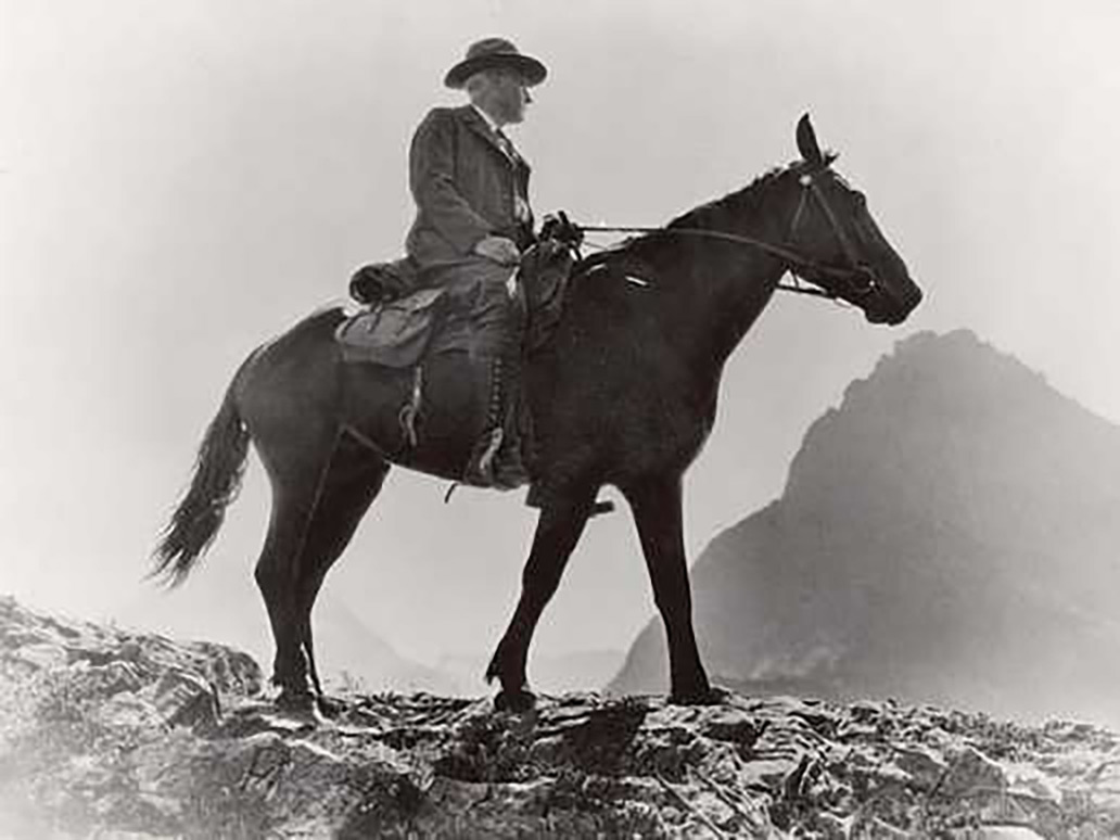 NPS Director Stephen T. Mather, shown here in Glacier National Park, enjoyed traveling the parks on horseback.  (National Park Service)