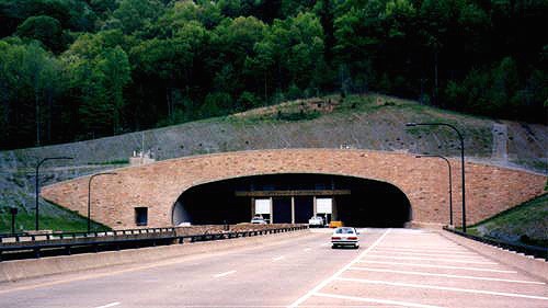 The Cumberland Gap Tunnel. This is the Tennessee portal where you can see the viaduct approach to the tunnel. Photo by H.B. Elkins. Photo from the Cumberland Gap Tunnel Web Site