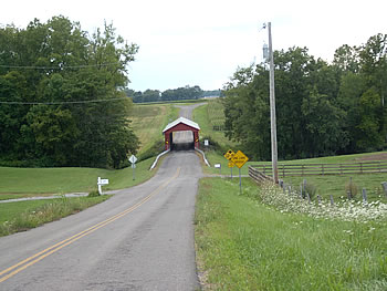 The McColly Covered Bridge was built in 1876. Located near Lewistown, Ohio on CR 13, the 125 foot long bridge crosses the Great Miami River.