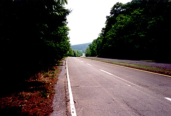 Although closed since 1968, this stretch of pavement between tunnels is in good condition.