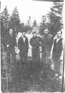 Survey crew at our campsite. From left to right: a temporary from Eugene, Cliff Polk, a medical student temporary, Arthur Clark, and Ben Beazley