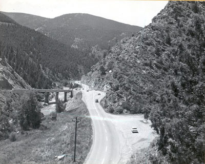 Colorado - Interstate Project I-70-3(1)250) - Ground view west (before construction) at Floyd Hill junction of I-70 and U.S. 6 showing normal daily traffic. Interstate Route 70 westerly from Denver.