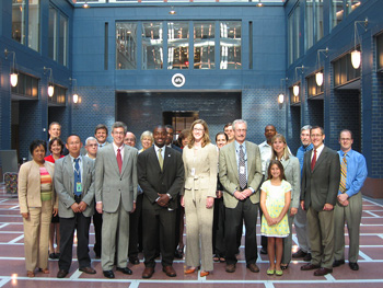 Pictured starting from the left: Sandra Jackson, DC Division; Pamela Stephenson, DC Division; Robert Mooney, DC Division; Vinh Hoang, DC Division; Frank Mirack, DC Division; Fred Skaer, FHWA Headquarters; Mark Kehrli, Division Administrator, DC Division; Bob Mihalek, DC Division; MaryAnn Naber, FHWA Headquarters; Emeka Moneme, DDOT Director; Harold Peaks, FHWA Headquarters; Ruth Rentch, FHWA Headquarters; Kathleen Penney, DDOT; Marlys Osterhues, FHWA Headquarters; Marlon Smoker, CH2M Hill; Barton Clark, DDOT; Michael Hicks, DC Division; Carol Kissal , DDOT with her daughter Chloe; Owen Lindauer, FHWA Headquarters; Bryan Nicol, CH2M Hill; and Michael Culp, FHWA Headquarters. Not shown: Sharon Vaughn-Fair, Eastern Legal Services, FHWA; Lavinia Thomas, Eastern Legal Services, FHWA; and Michael Saunders, FHWA Headquarters.