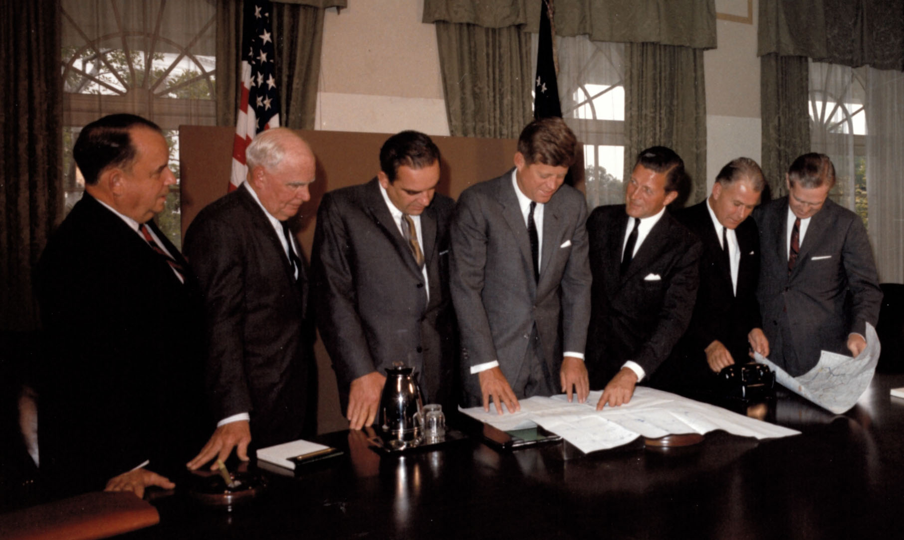 On September 17, 1963, President John F. Kennedy met in the White House to discuss the routing of I-24 with the Governors from the four affected States. Left to right: Governor John Dalton (Missouri), Governor Frank Clement (Tennessee), Secretary of Commerce Luther Hodges, President Kennedy, Governor Otto Kerner (Illinois), Governor Bert Combs (Kentucky), and Federal Highway Administrator Rex M. Whitton. (Photo courtesy John F. Kennedy Library)