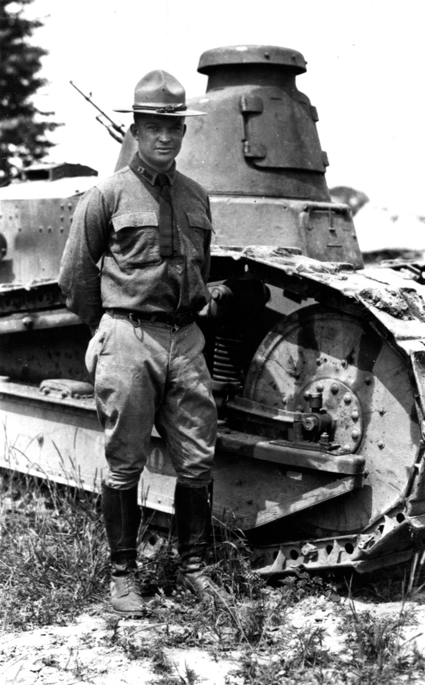 Major Eisenhower in front of a tank at Camp Meade, MD in 1919