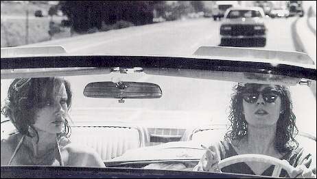 Geena Davis (left) and Susan Sarandon are two best friends whose weekend getaway unexpectedly takes them in an adventurous, often humorous race against time in Thelma and Louise, 1991. Photo: Courtesy of The Museum of Modern Art Stills Archive