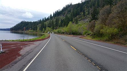 Looking west along the current roadway.
